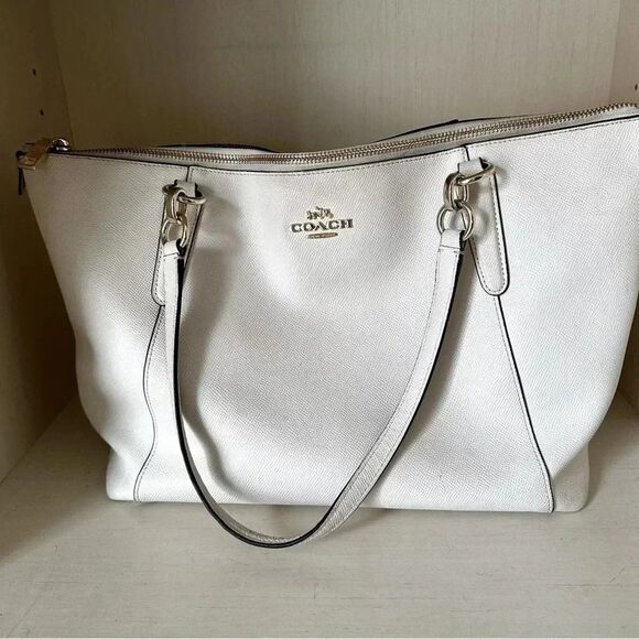 Coach Handbags - Coach ivory leather shoulder bag with gold detail 16” x 10”